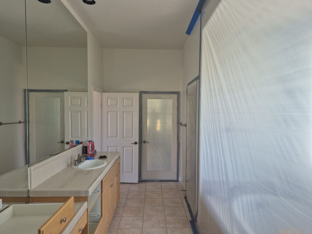 Bathroom work area separated by plastic containment