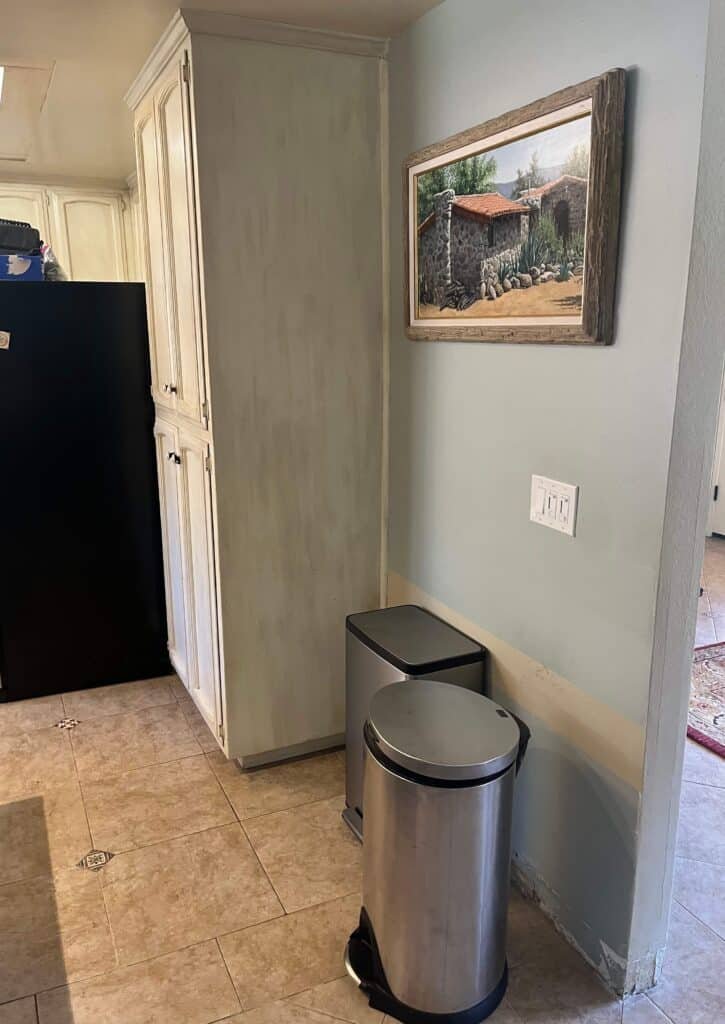Wall discoloration beside a refrigerator opening