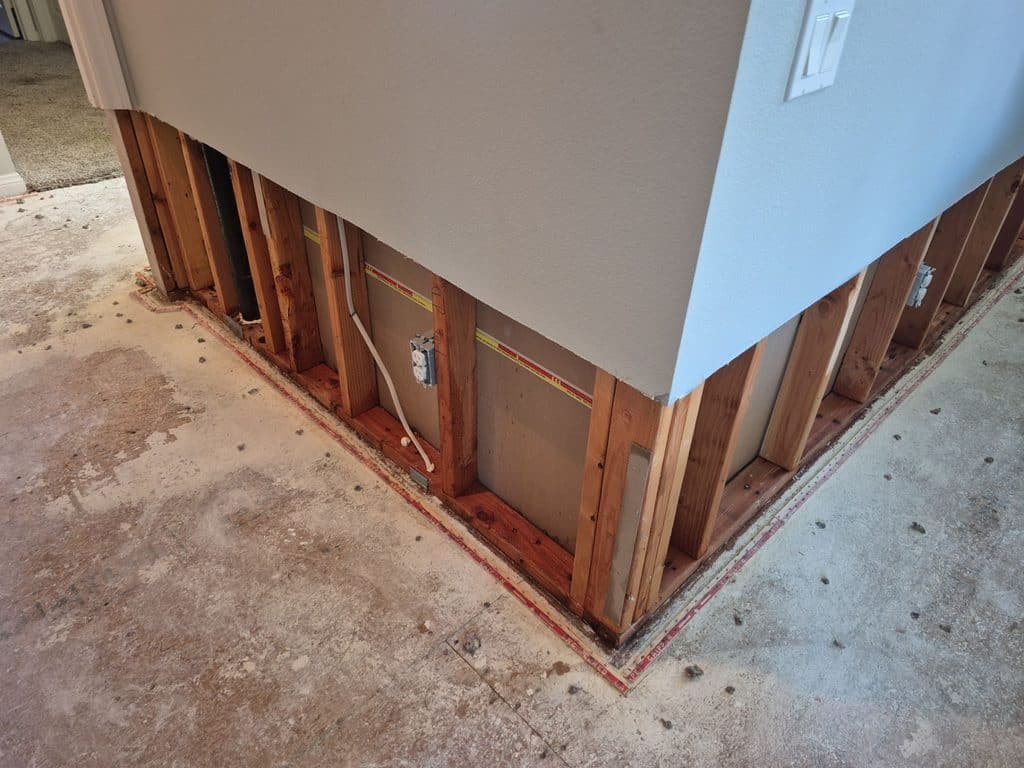 Lower wall covering removed around an interior corner — Westlake Village