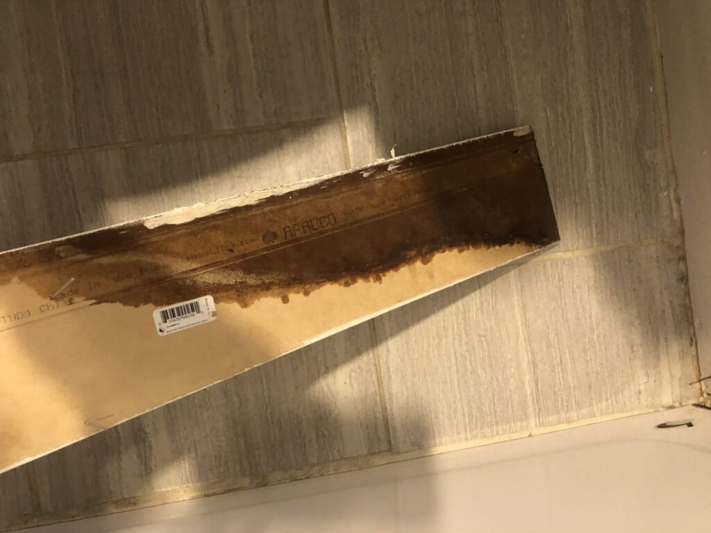 Ceiling opening exposing framing above an interior room